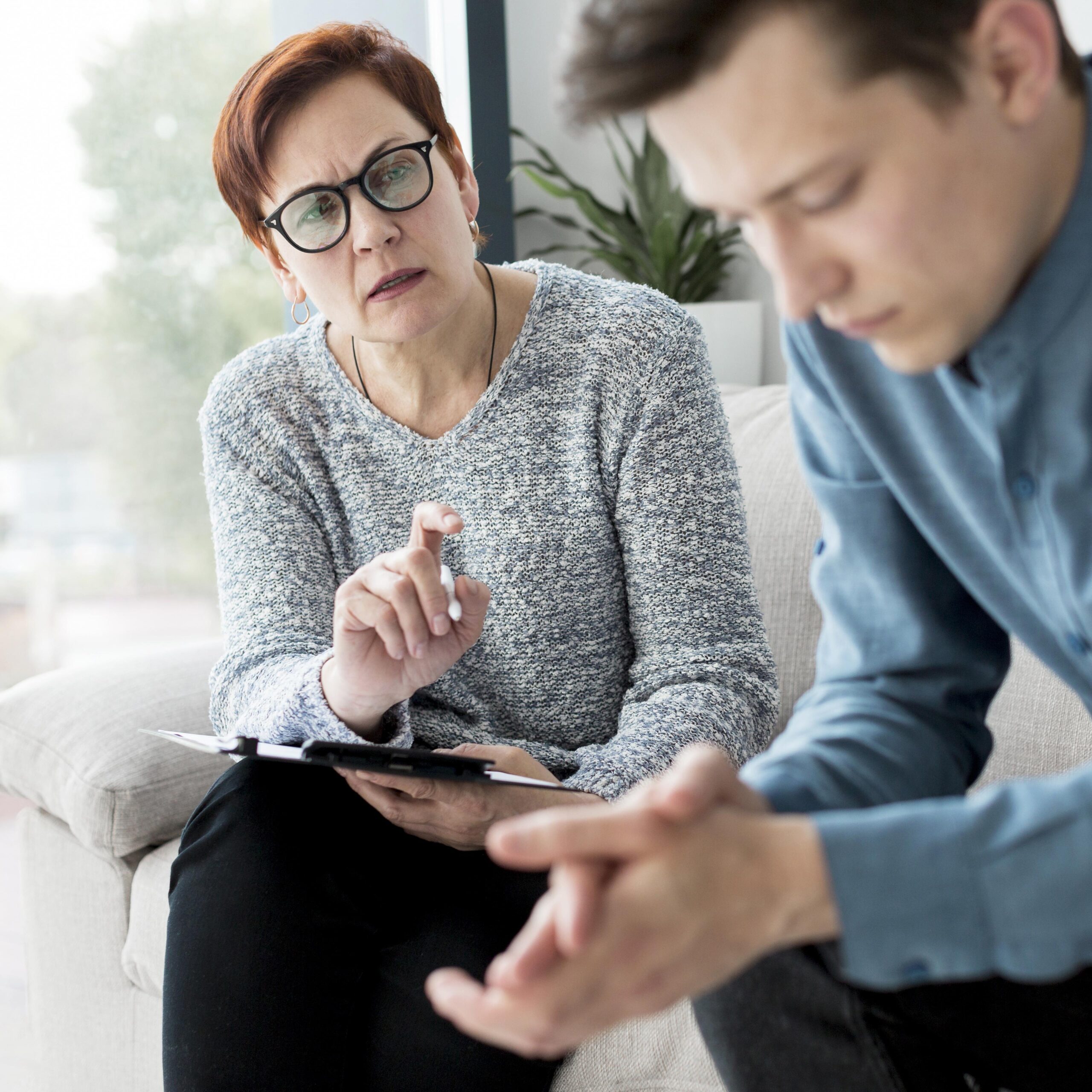 Psychologist consulting patient